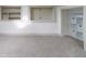 Bright bedroom featuring neutral carpet, white walls, storage, and an open closet at 1515 Dawson St, Indianapolis, IN 46203