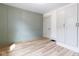 The bedroom boasts unique wainscoting, closet space, and ample natural light at 1515 Dawson St, Indianapolis, IN 46203