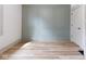 The bedroom boasts unique wainscoting and ample natural light at 1515 Dawson St, Indianapolis, IN 46203