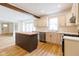 Bright kitchen with an island, stainless steel appliances and modern cabinetry at 1515 Dawson St, Indianapolis, IN 46203