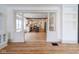 Bright living room featuring wood floors, opening to a modern kitchen and dining area at 1515 Dawson St, Indianapolis, IN 46203