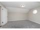 Bedroom with neutral walls, neutral carpet, and a geometric window at 1528 N Dukane Way, Indianapolis, IN 46214