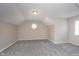 Bedroom with neutral walls, neutral carpet, and a geometric window at 1528 N Dukane Way, Indianapolis, IN 46214