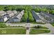 Aerial view of the townhome community with tree lined streets and proximity to nearby neighborhoods at 16060 Barringer Ct, Westfield, IN 46074