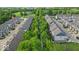 Overhead view of stylish townhomes nestled among lush green trees in a well-maintained neighborhood at 16060 Barringer Ct, Westfield, IN 46074
