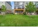 Large grassy backyard, patio area, and deck provide lots of outdoor living and green space at 16060 Barringer Ct, Westfield, IN 46074