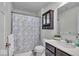 Functional bathroom with a shower, vanity, and dark wood cabinet at 16060 Barringer Ct, Westfield, IN 46074
