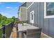 Covered deck with outdoor seating and a great view of the backyard at 16060 Barringer Ct, Westfield, IN 46074