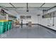 The garage has epoxy floors, storage and an overhead rack at 16060 Barringer Ct, Westfield, IN 46074