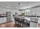 Beautiful kitchen features stainless steel appliances, a large island with barstool seating, and ample counter space at 16060 Barringer Ct, Westfield, IN 46074