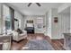 The Living Room has a lot of natural light with a piano and wooden floors at 16060 Barringer Ct, Westfield, IN 46074