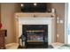 Elegant fireplace with a marble surround, decorative mantle, and a cozy ambiance at 172 Arabian Ct, Whiteland, IN 46184