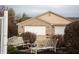 Charming home exterior with two white benches, lush landscaping, and inviting curb appeal at 172 Arabian Ct, Whiteland, IN 46184
