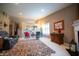 Inviting living room with a neutral color palette, plush carpeting, and comfortable seating at 172 Arabian Ct, Whiteland, IN 46184