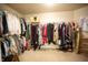 Organized walk-in closet with ample storage space for clothes and accessories at 172 Arabian Ct, Whiteland, IN 46184