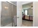 Bathroom with a glass-enclosed shower and a door opening to the main bedroom at 181 Kiawah Dr, Whiteland, IN 46184