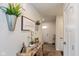 Bright and welcoming entryway with modern decor, light wood floors, and white trim at 181 Kiawah Dr, Whiteland, IN 46184