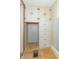 Built in storage area featuring upper cabinets, lower drawers, and a small closet space at 218 Illinois St, Shirley, IN 47384