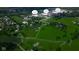 An aerial view of the community shows the home's proximity to local schools at 2428 S Morgantown Rd, Greenwood, IN 46143