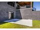 Brick backyard exterior features a concrete patio and a small upper-level balcony at 2428 S Morgantown Rd, Greenwood, IN 46143
