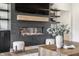Modern fireplace with a sleek design, complemented by stylish decor and inviting furniture at 2428 S Morgantown Rd, Greenwood, IN 46143