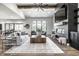 Bright, open-concept living room with modern furnishings, a fireplace, and ample natural light at 2428 S Morgantown Rd, Greenwood, IN 46143