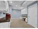 Finished basement with a long counter top, cabinets, and desk area at 2468 Wyndham S Pl, Columbus, IN 47203