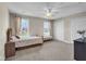 Bright bedroom featuring two windows and a double door closet at 2468 Wyndham S Pl, Columbus, IN 47203