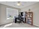 Home office featuring a built-in desk, ample storage, and a bright window at 2468 Wyndham S Pl, Columbus, IN 47203