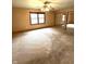 Bedroom features a window, closet with mirrored doors, and neutral carpet, creating a comfortable and inviting space at 2690 Trailridge Ct, Martinsville, IN 46151