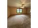 Bedroom features a window and a closet with mirrored doors, creating a comfortable and functional space at 2690 Trailridge Ct, Martinsville, IN 46151