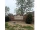 Elegant brick community sign displaying 'Morgan Trails' amidst manicured landscaping and mature shrubs at 2690 Trailridge Ct, Martinsville, IN 46151