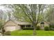 Charming brick home featuring an attached garage and a well-maintained front lawn, perfect for suburban living at 2690 Trailridge Ct, Martinsville, IN 46151