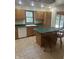 Charming kitchen featuring ample counter space and an island with seating at 2690 Trailridge Ct, Martinsville, IN 46151