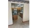 Kitchen featuring light wood cabinets, neutral tile floors and green countertops at 2690 Trailridge Ct, Martinsville, IN 46151