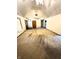 Spacious living room with high ceilings, neutral carpet, and a view of the front entrance at 2690 Trailridge Ct, Martinsville, IN 46151