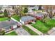 Aerial view of a well-maintained neighborhood, showcasing a charming brick home at 2828 N Moreland Ave, Indianapolis, IN 46222
