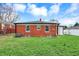 Image of the home's backyard with a well maintained lawn and perimeter fencing at 2828 N Moreland Ave, Indianapolis, IN 46222