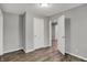 Bedroom featuring wood-look floors and natural light at 2828 N Moreland Ave, Indianapolis, IN 46222