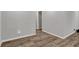 Spacious hallway with modern flooring, connecting various rooms in the house at 2828 N Moreland Ave, Indianapolis, IN 46222