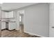 The kitchen area features white cabinets and a subway tile backsplash at 2828 N Moreland Ave, Indianapolis, IN 46222