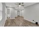 Open living room with new flooring, and a view into the home's interior at 2828 N Moreland Ave, Indianapolis, IN 46222