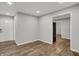 Open-concept living room featuring modern floors and a view into the home's interior at 2828 N Moreland Ave, Indianapolis, IN 46222