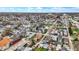 High-angle view of an urban area filled with various buildings, roads, and a mix of residential and industrial structures at 305 Sanders St, Indianapolis, IN 46225