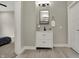 Bathroom with modern vanity, mirror and decorative accents, offering comfort and style at 305 Sanders St, Indianapolis, IN 46225