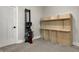 An empty bedroom with an exercise machine and built-in shelving, perfect for a home gym setup at 305 Sanders St, Indianapolis, IN 46225
