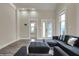 Features a modern living area with high ceilings, contemporary decor, and seamless kitchen access at 305 Sanders St, Indianapolis, IN 46225
