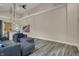 Cozy living space featuring high ceilings, contemporary lighting, and a bridge-themed art piece at 305 Sanders St, Indianapolis, IN 46225