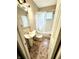 Traditional bathroom featuring a sink, toilet, and shower/tub combo at 3536 N Hawthorne Ln, Indianapolis, IN 46218