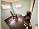 View of a bedroom with two windows and hardwood flooring at 3536 N Hawthorne Ln, Indianapolis, IN 46218